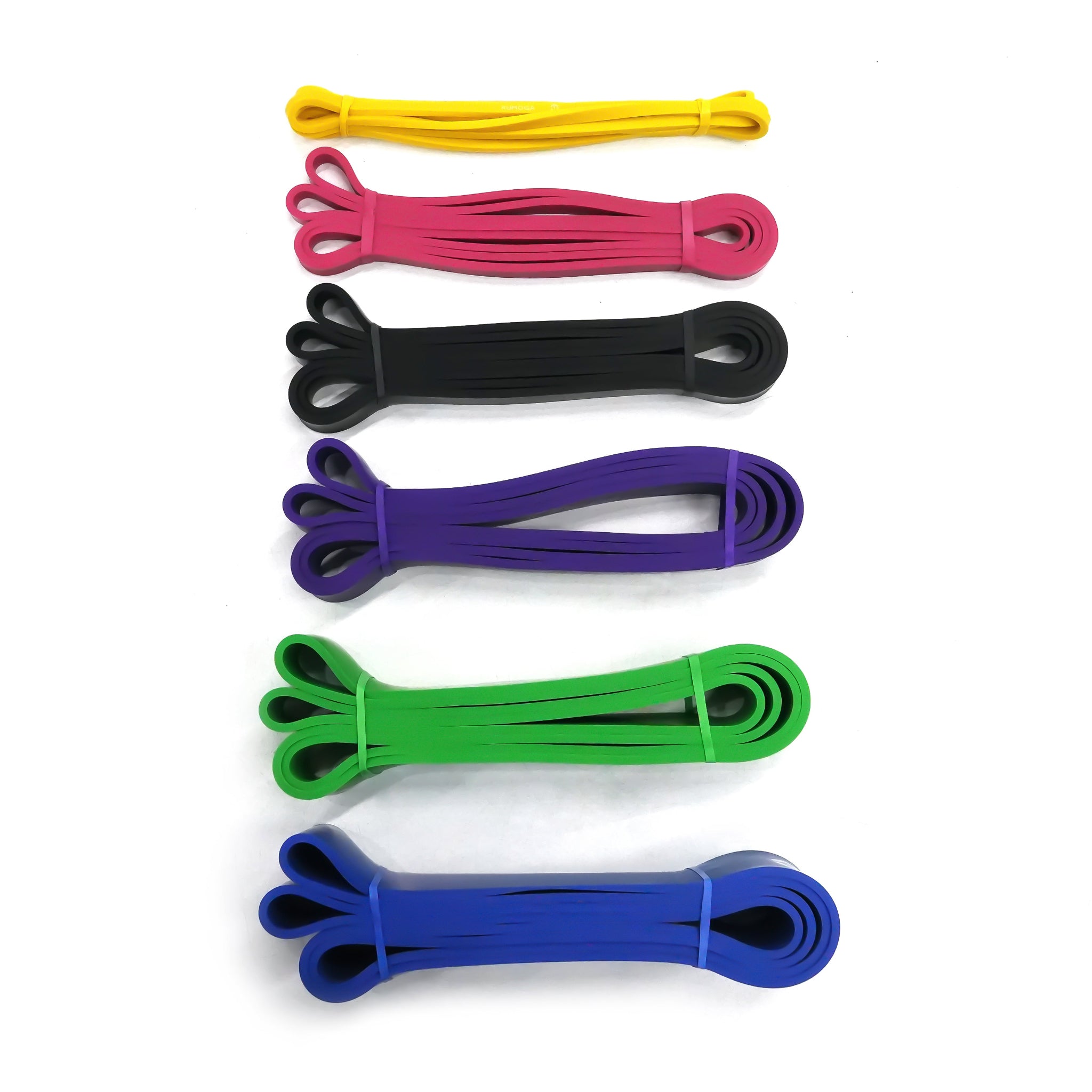 Set of colorful resistance bands on a white background